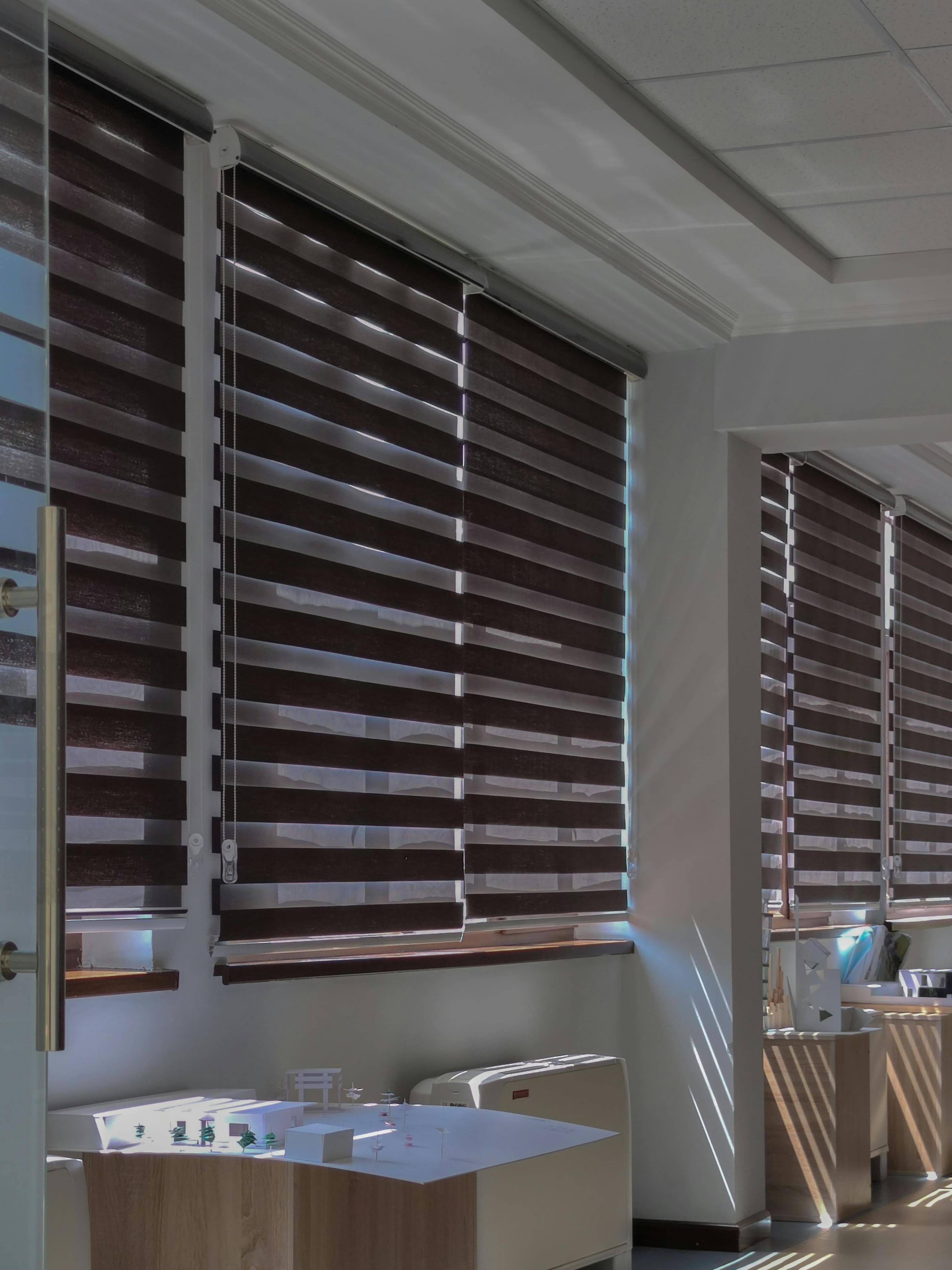 Layered indoor blinds providing privacy and filtered light