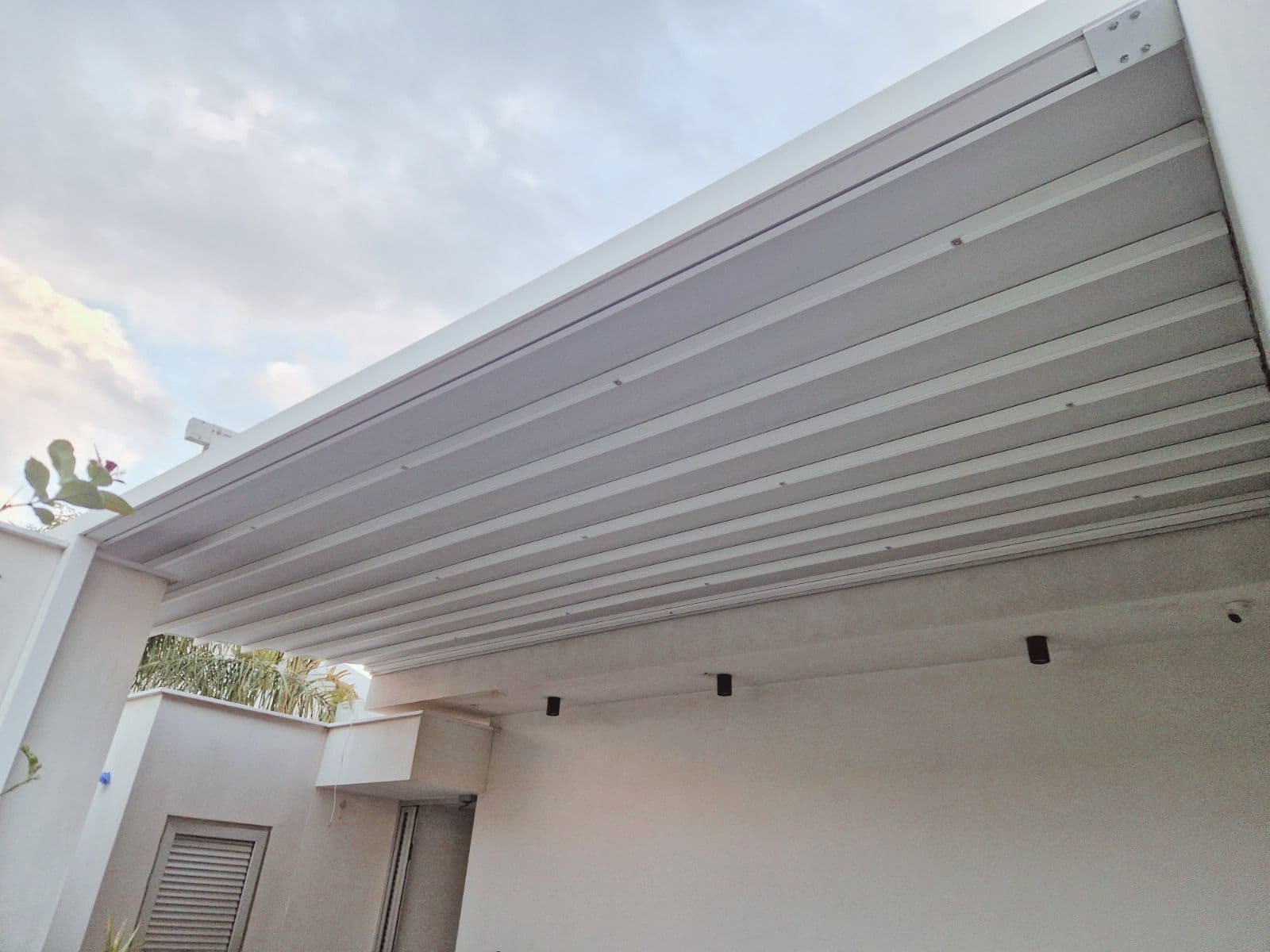 Modern pergola providing shade in an outdoor living area